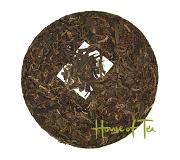 Pu-erh te i form av en rund Bing Cha-kaka Pu-erh te i form av en rund Bing Cha-kaka